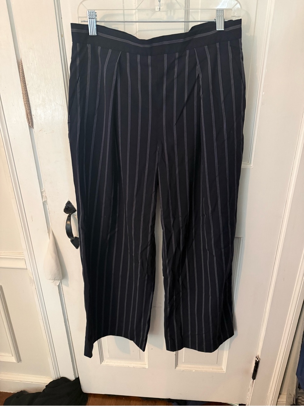 Flared navy pinstripe dress pants for women